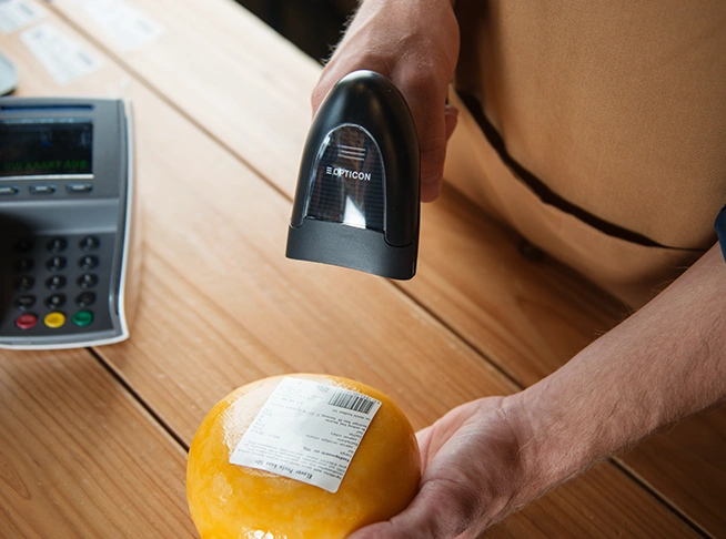Cheese specialty store with Opticon Handheld 2D barcode Scanner