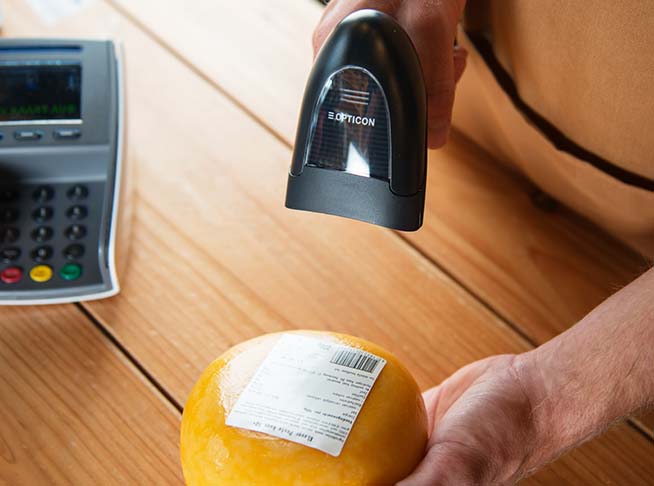 Cheese specialty store with Opticon L-50 Handheld 2D barcode Scanner